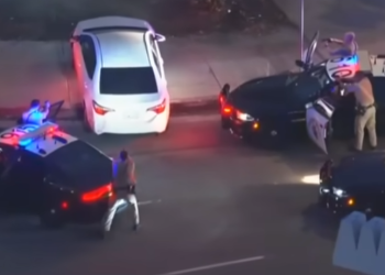 High-Speed Freeway Chase Ends in Sidewalk Standoff, Suspect Pulled From Car